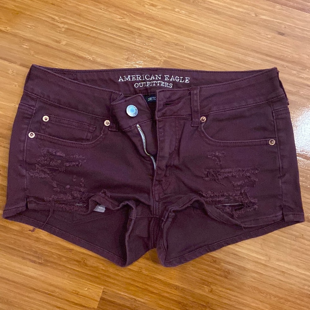 Maroon American Eagle shorts.